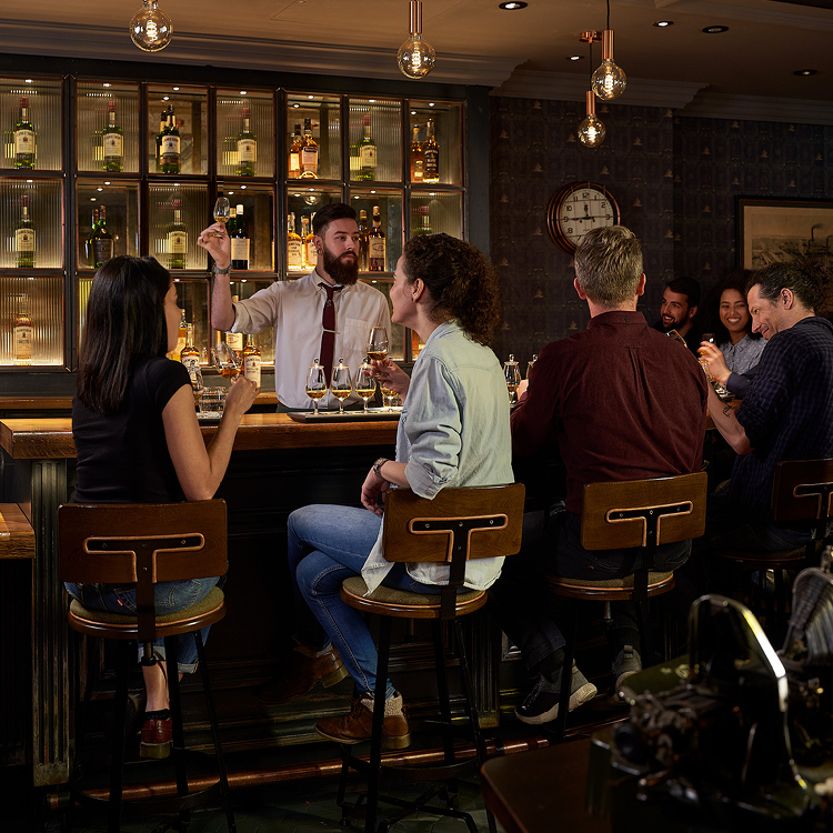 People sitting at bar enjoying a Jameson Irish Whiskey tasting experience