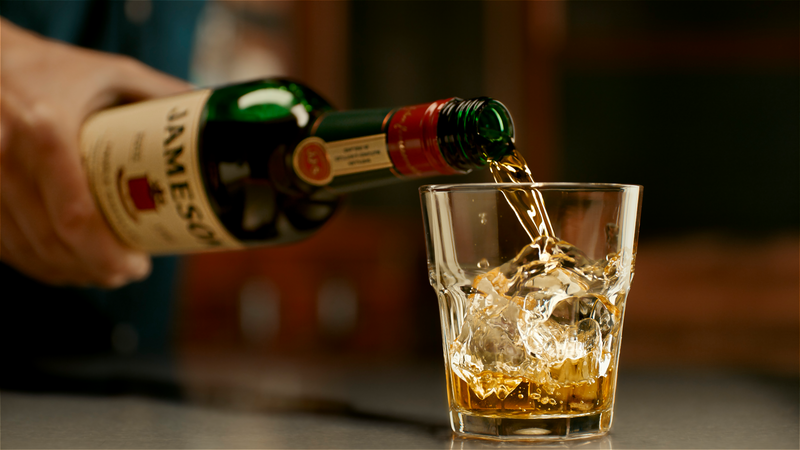 Jameson Whiskey poured over ice into a tumbler