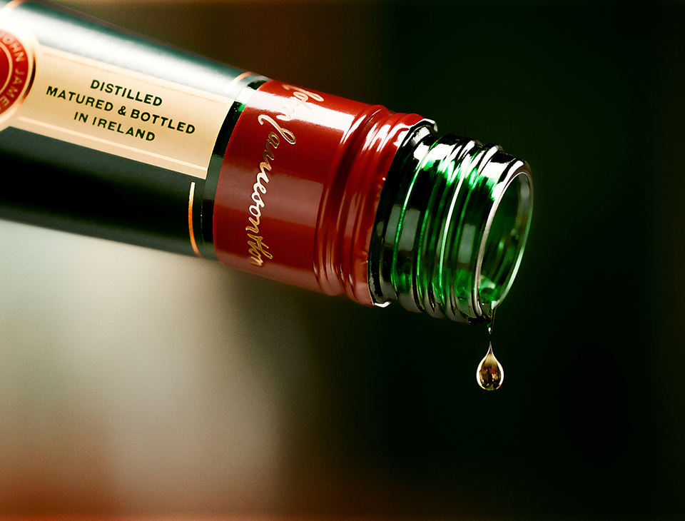 Jameson Irish Whiskey droplet from opened bottle