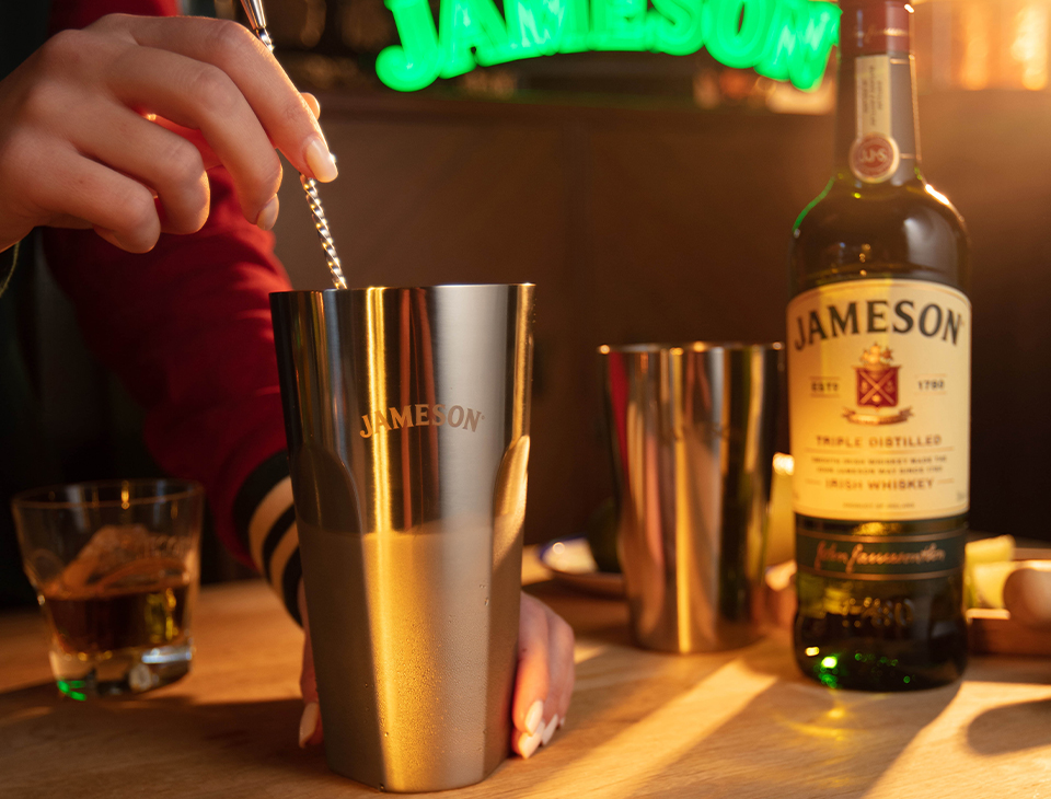 friends making whiskey cocktails with Jameson Irish Whiskey