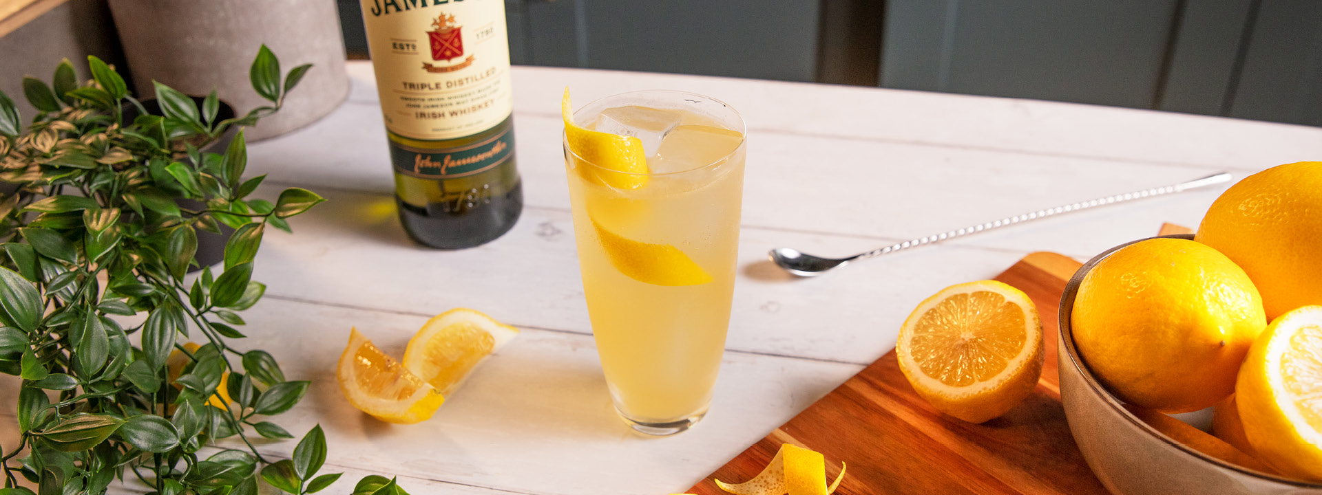 jameson irish whiskey cocktail garnished with a lemon spiral